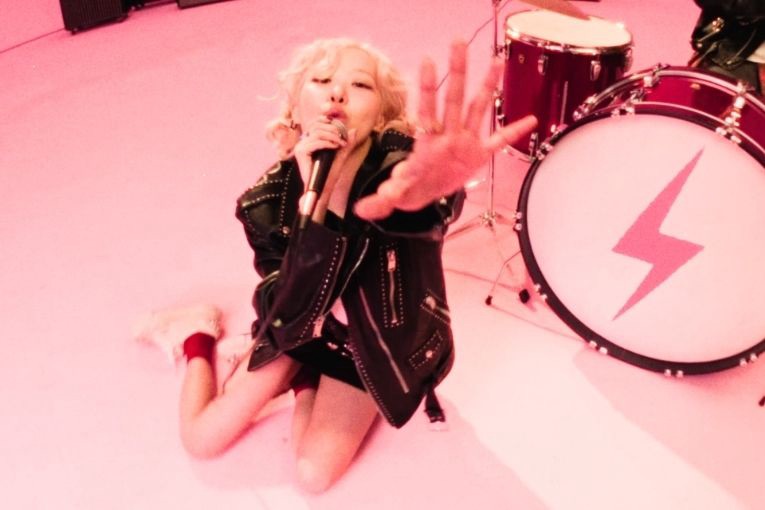 ROSÉ and Bruno Mars performing in the “APT.” music video which became the most viewed music video by a female K-pop artist in YouTube history.